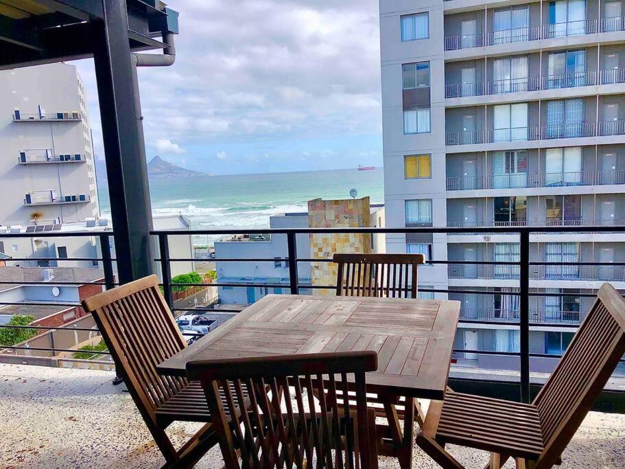 Top floor apartment by the beach