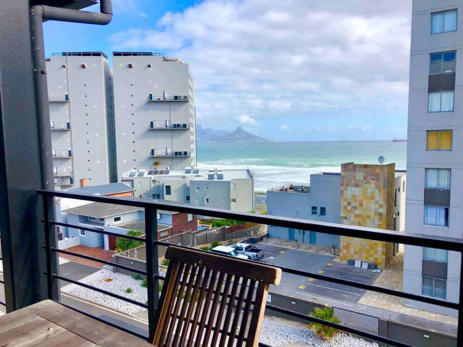 Top floor apartment by the beach