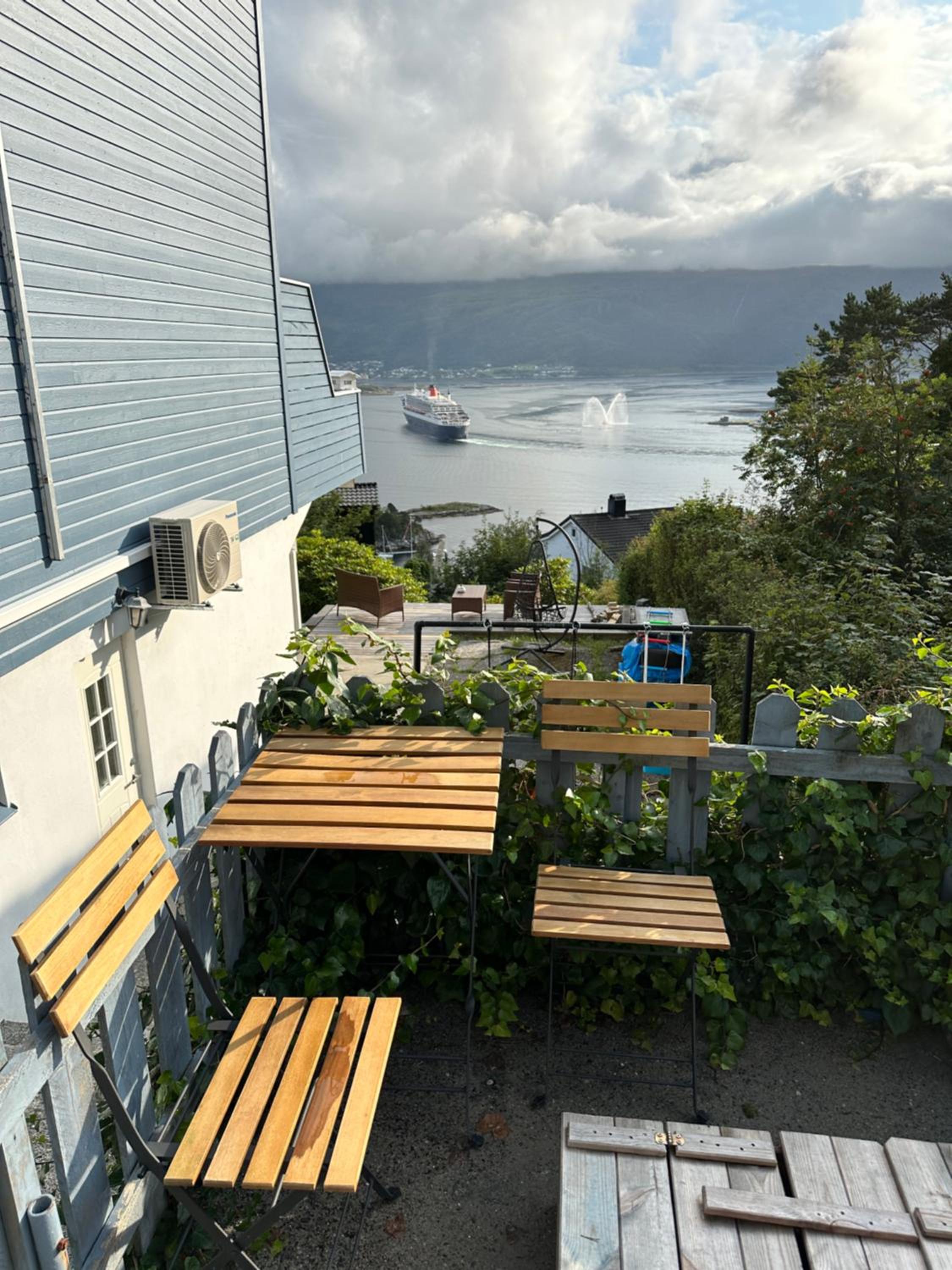 Great place with a stunning view of the mountains and the fjord view 5