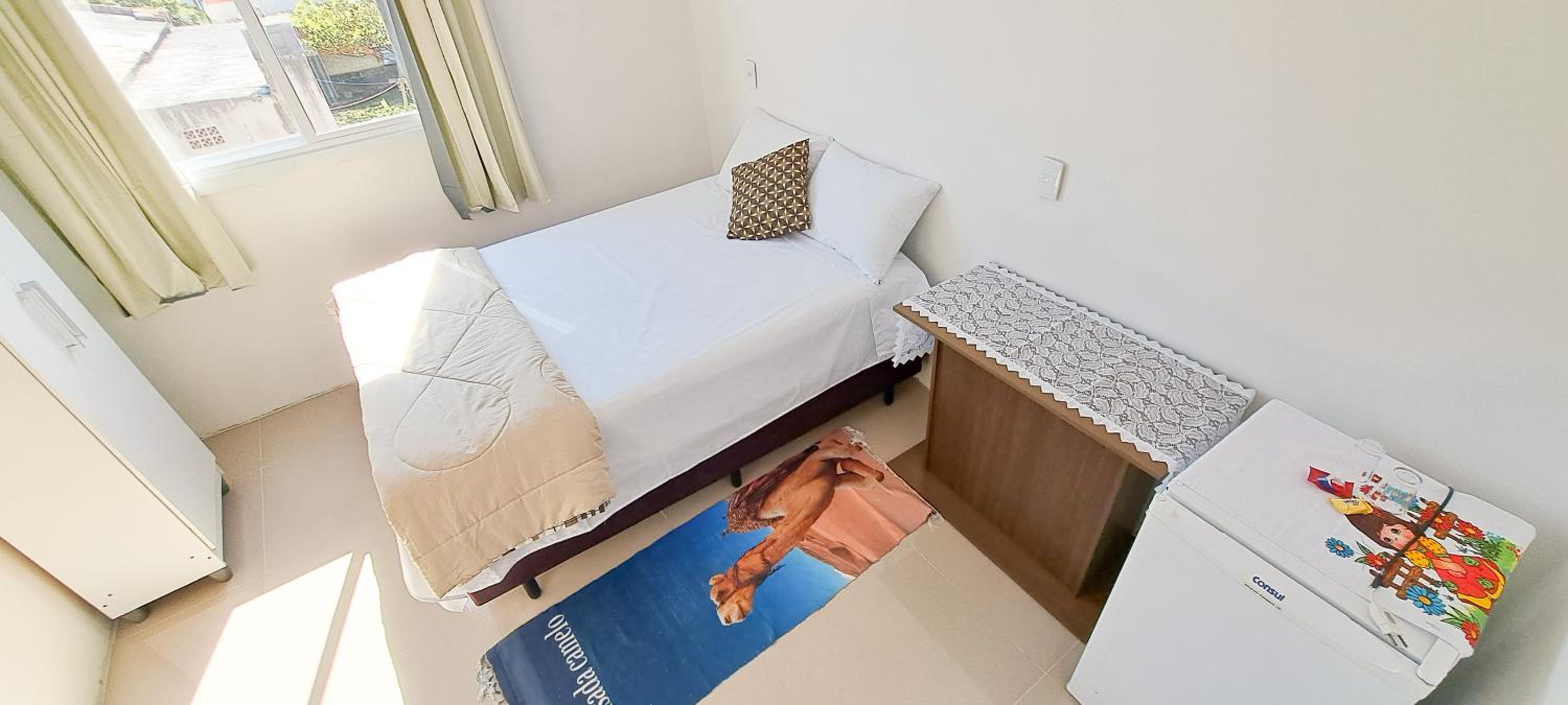 Camelo locação de Suítes Individuais Pousada com Cozinha e Sala Compartilhada