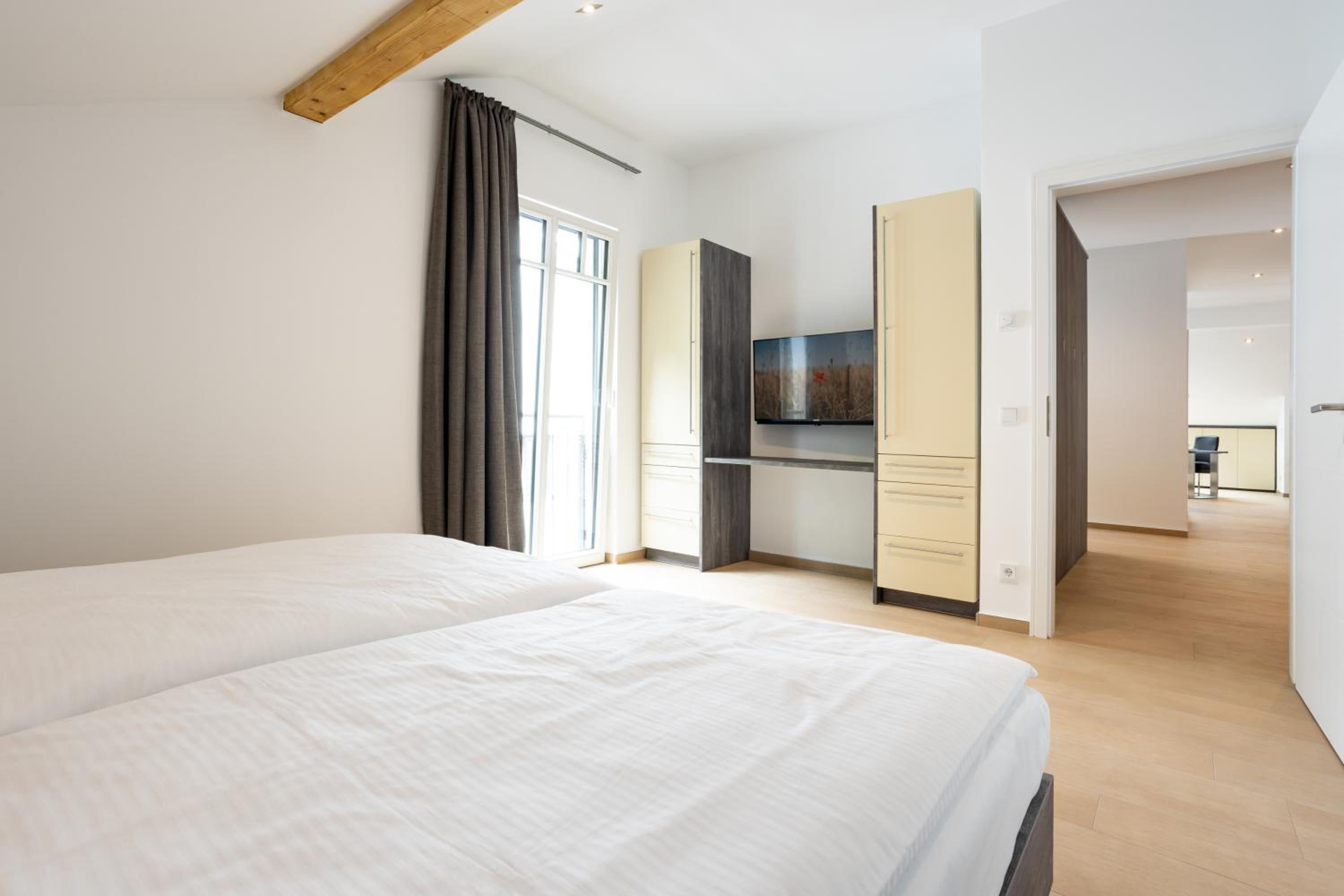 Villa Beatrice - WE 13 mit eigener Sauna, 2 Dachterrassen, kleiner Meerblick