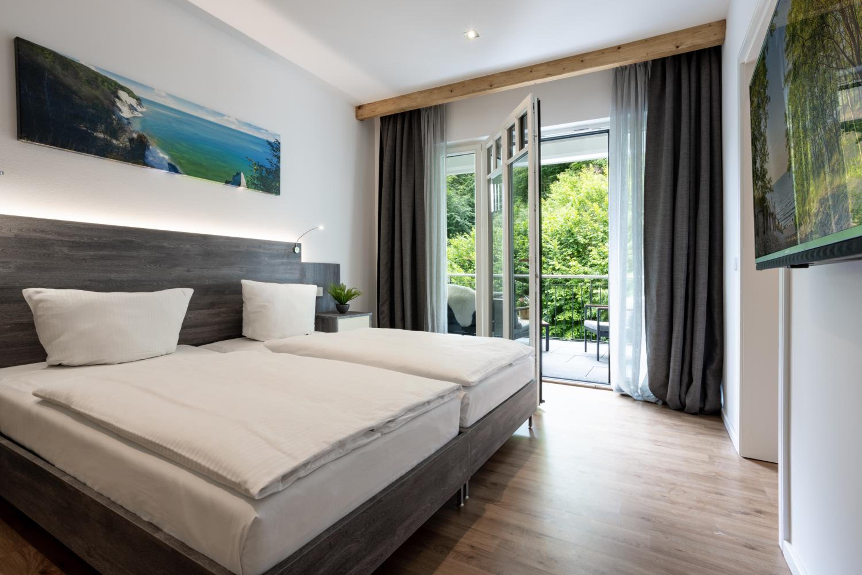 Villa Beatrice - WE 13 mit eigener Sauna, 2 Dachterrassen, kleiner Meerblick
