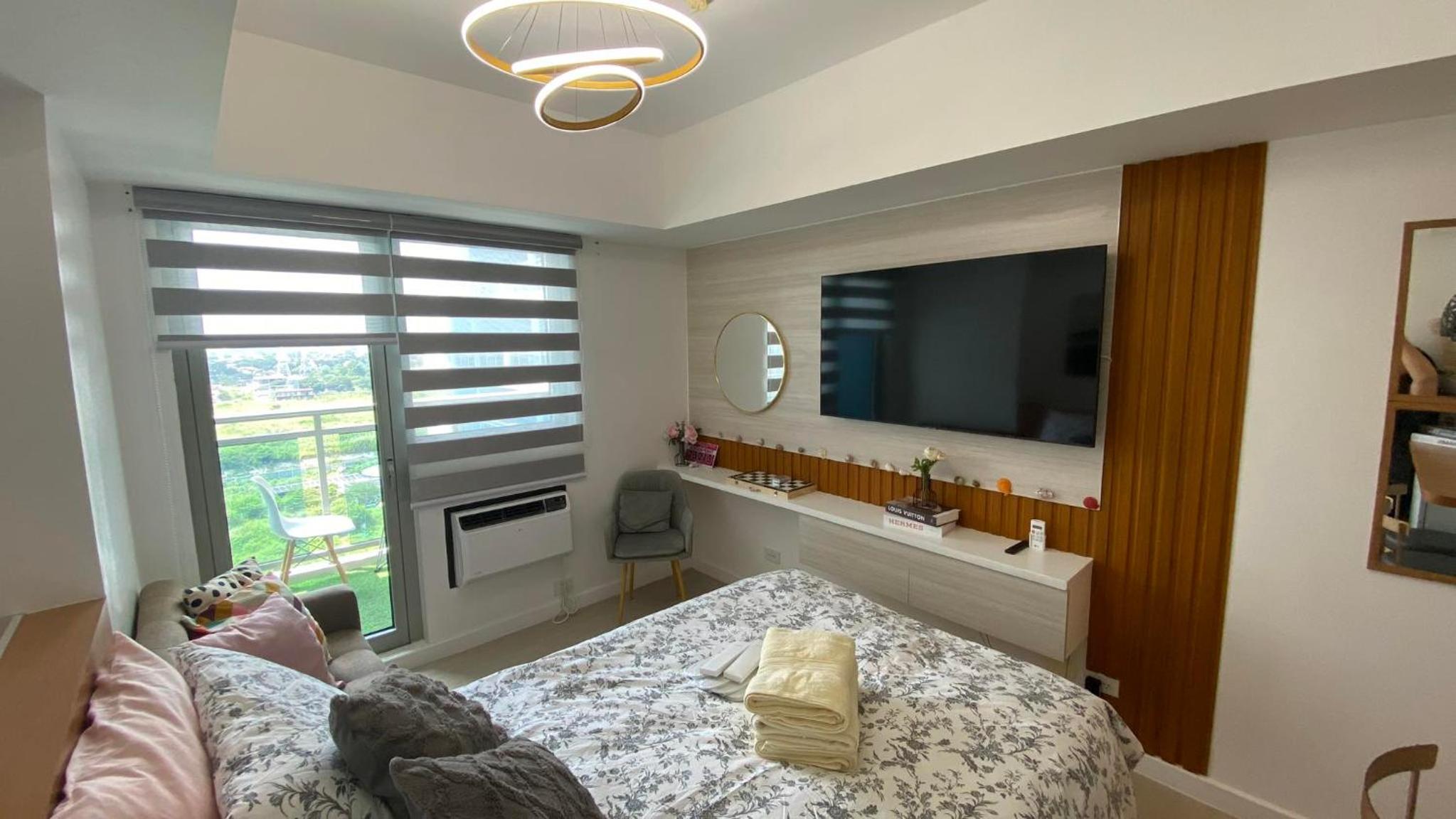 LeisureStay Studio - Azure North by THE BALI CORNER AT AZURE NORTH, Wave Pool and Man-made beach view
