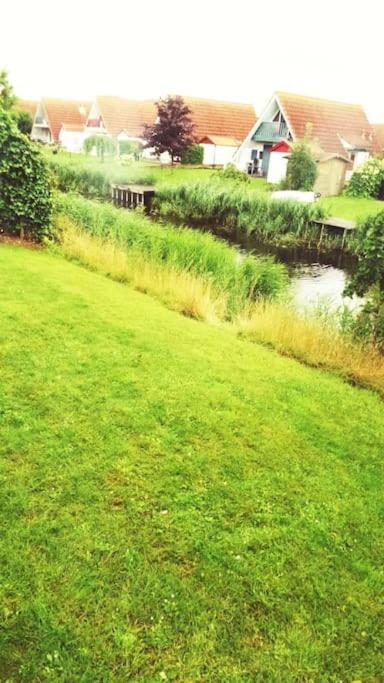 Charming Waterfront Chalet Near Lauwersmeer