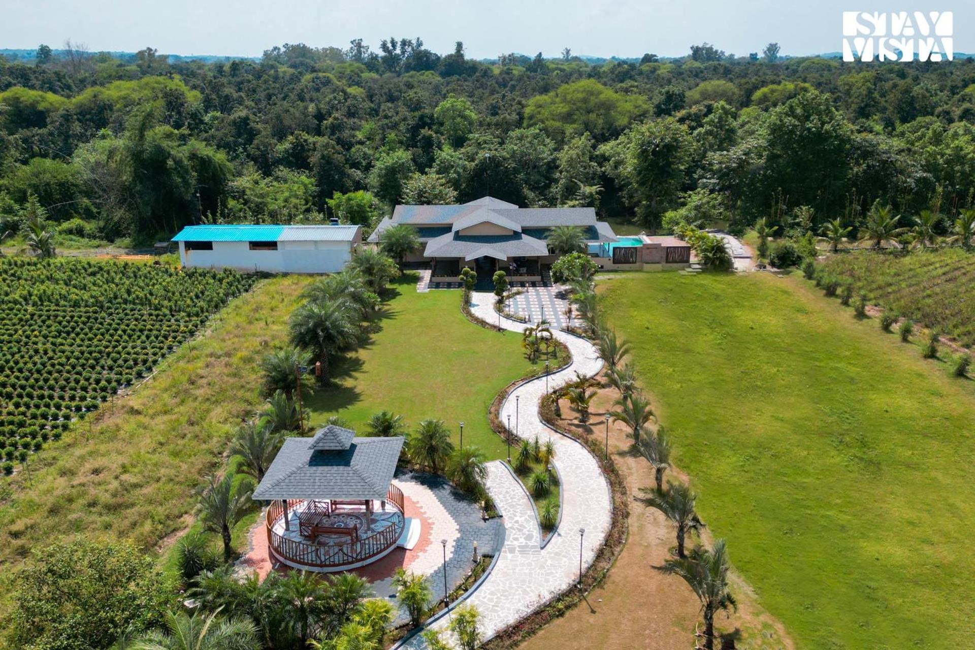 StayVista at Riverfront Cottage with Scenic River view, BBQ, Bonfire, Gazebo, Pet friendly