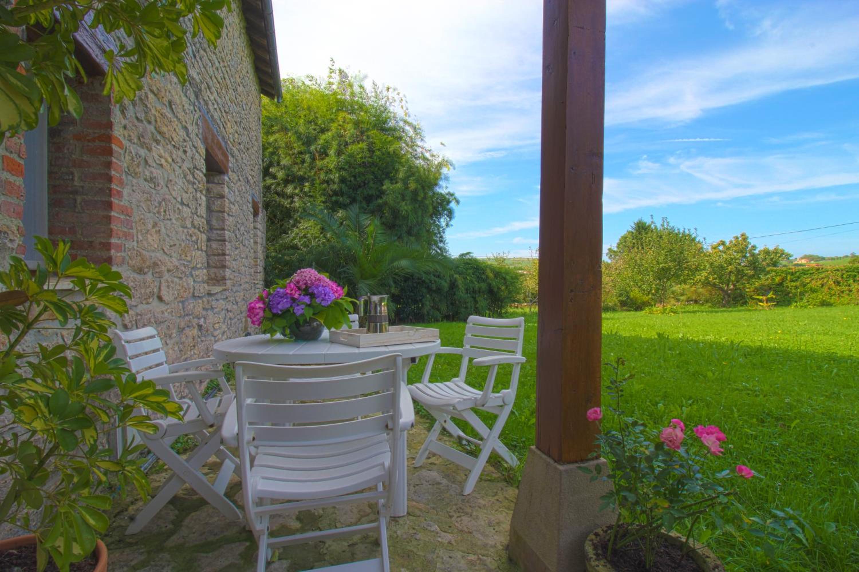 Apartamento La Ermita con jardín