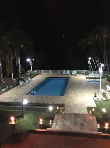 Casa Guacuri - Casa de temporada e eventos - apartamentos com suítes - Piscinas e Amplo Estacionamento