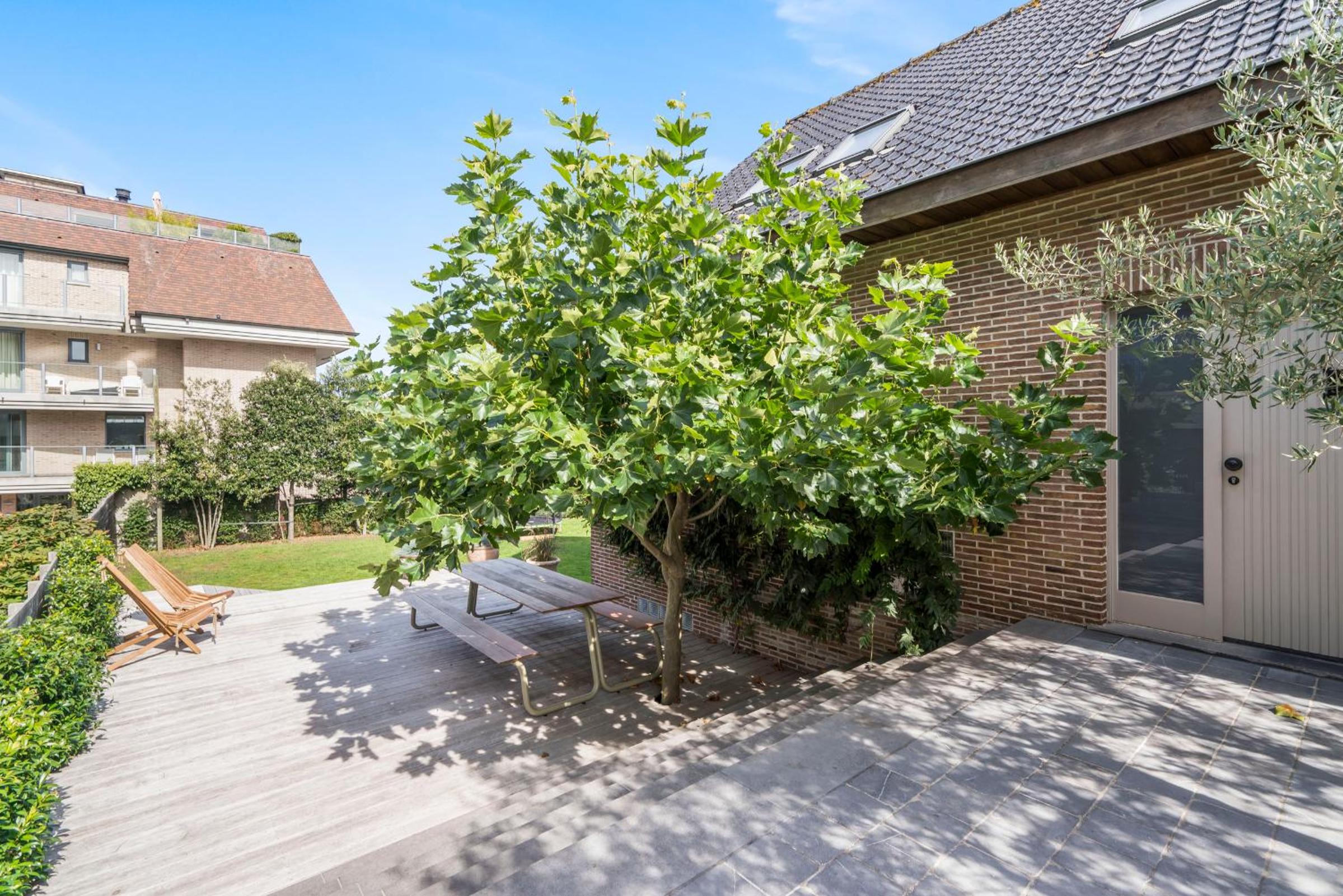 Familievilla bij strand met privé tuin & parking