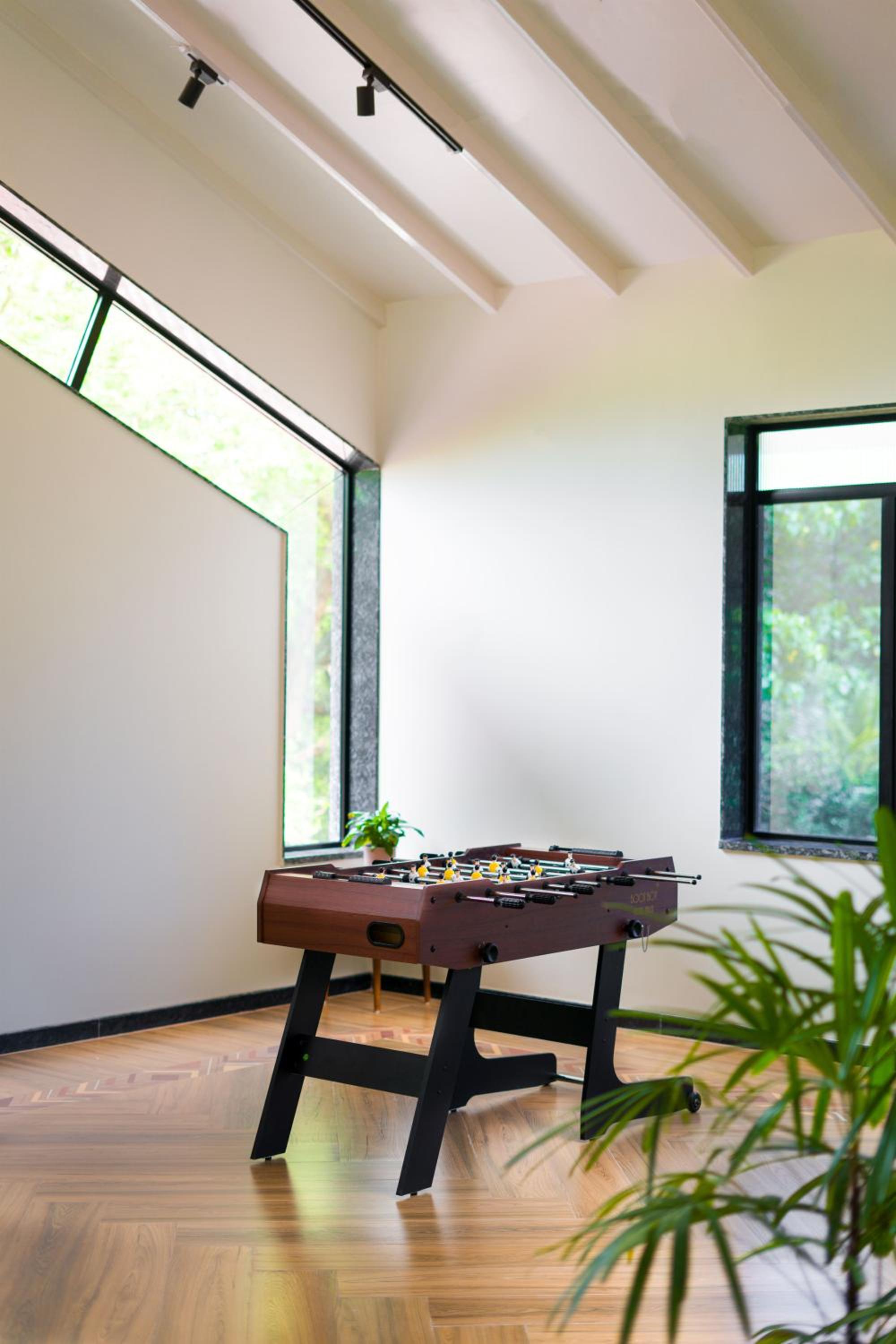 SaffronStays Arabella - 4BR bohemian pool villa with sunken lounge, foosball, PS4 & mango orchard views in Alibaug