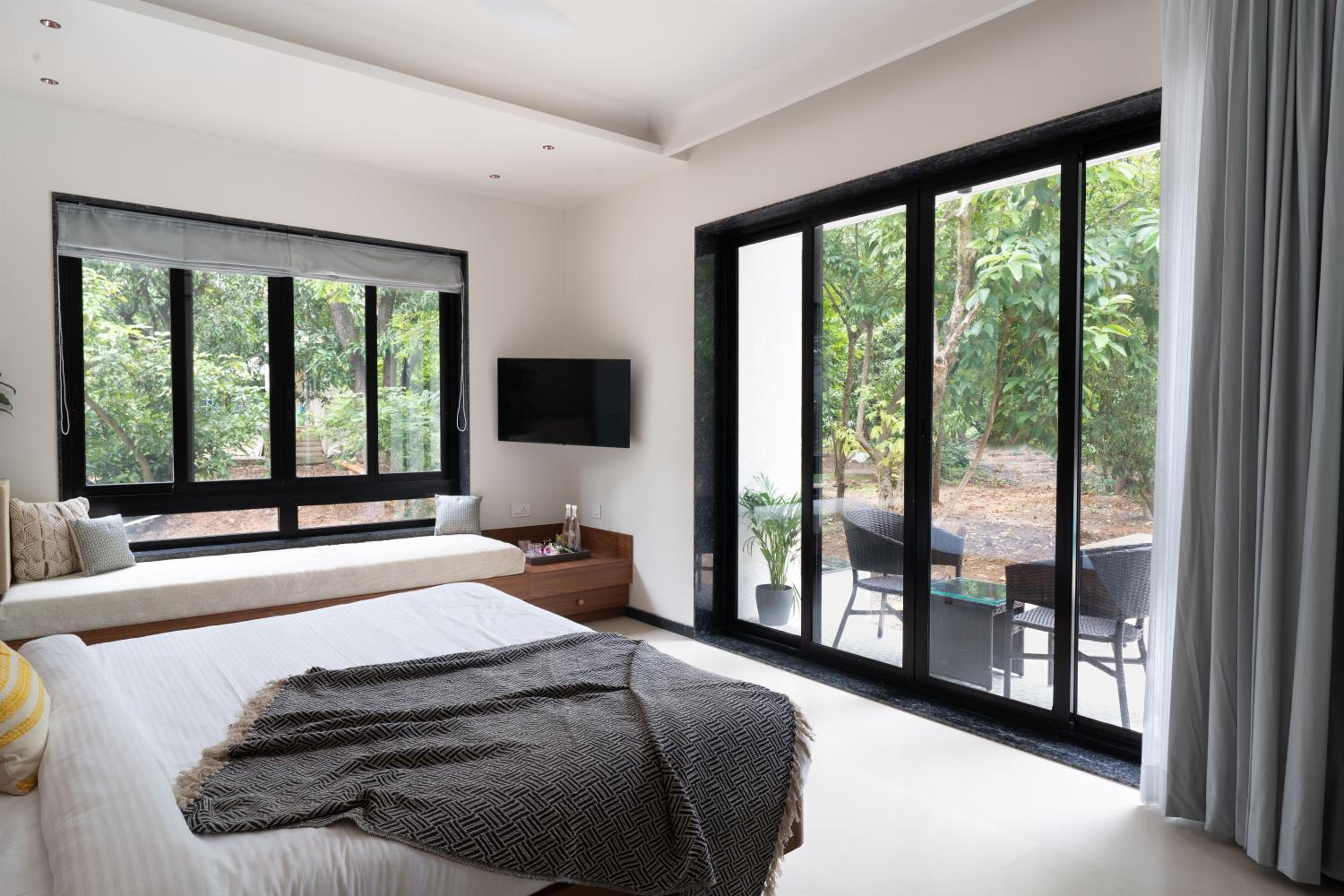 SaffronStays Arabella - 4BR bohemian pool villa with sunken lounge, foosball, PS4 & mango orchard views in Alibaug