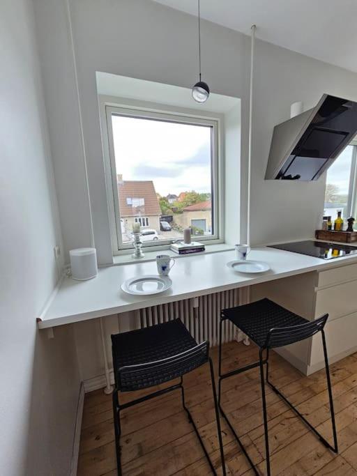 Lejlighed med altan og gratis parkering