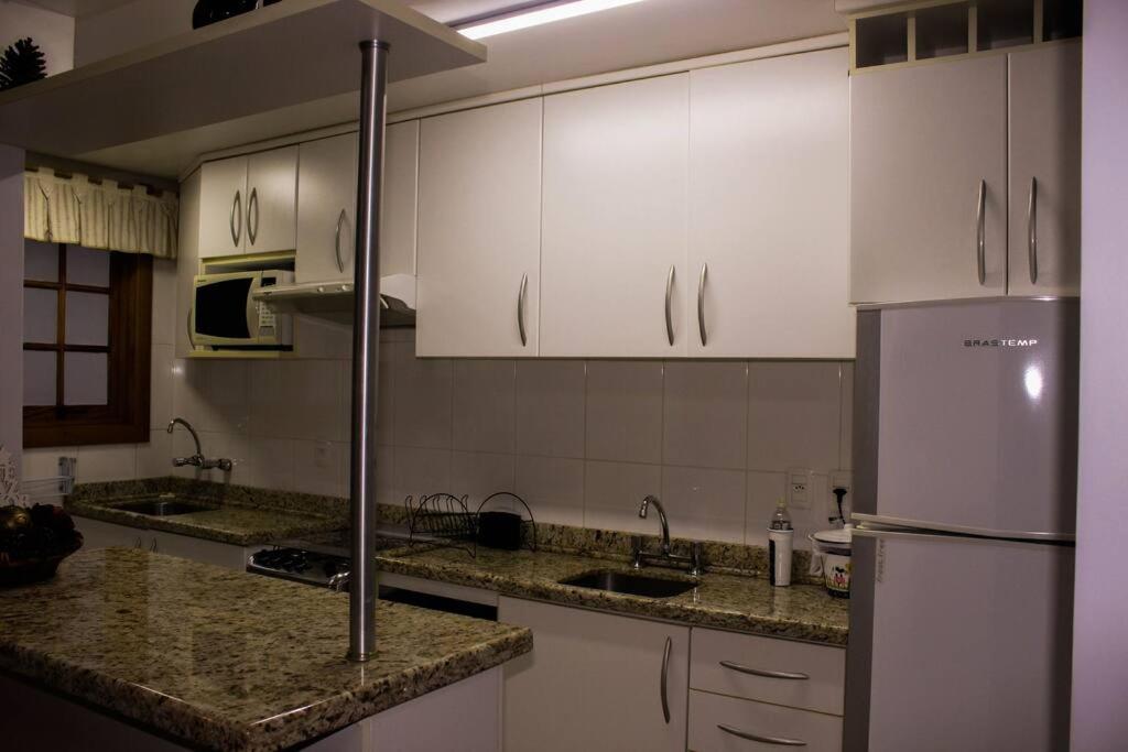 Apê 2 quartos à 20m da Rua Coberta de Gramado