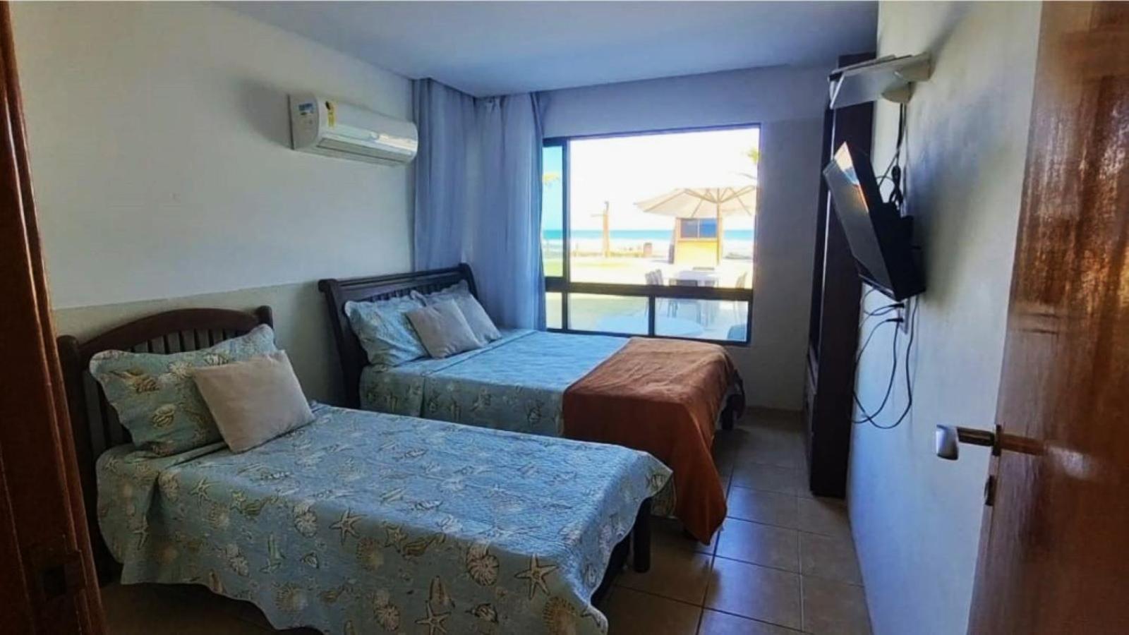 Casa à beira-mar 23 - Pé na Areia, Tipo Bangalô, Piscina Privativa, Muro Alto, Porto de Galinhas, PE