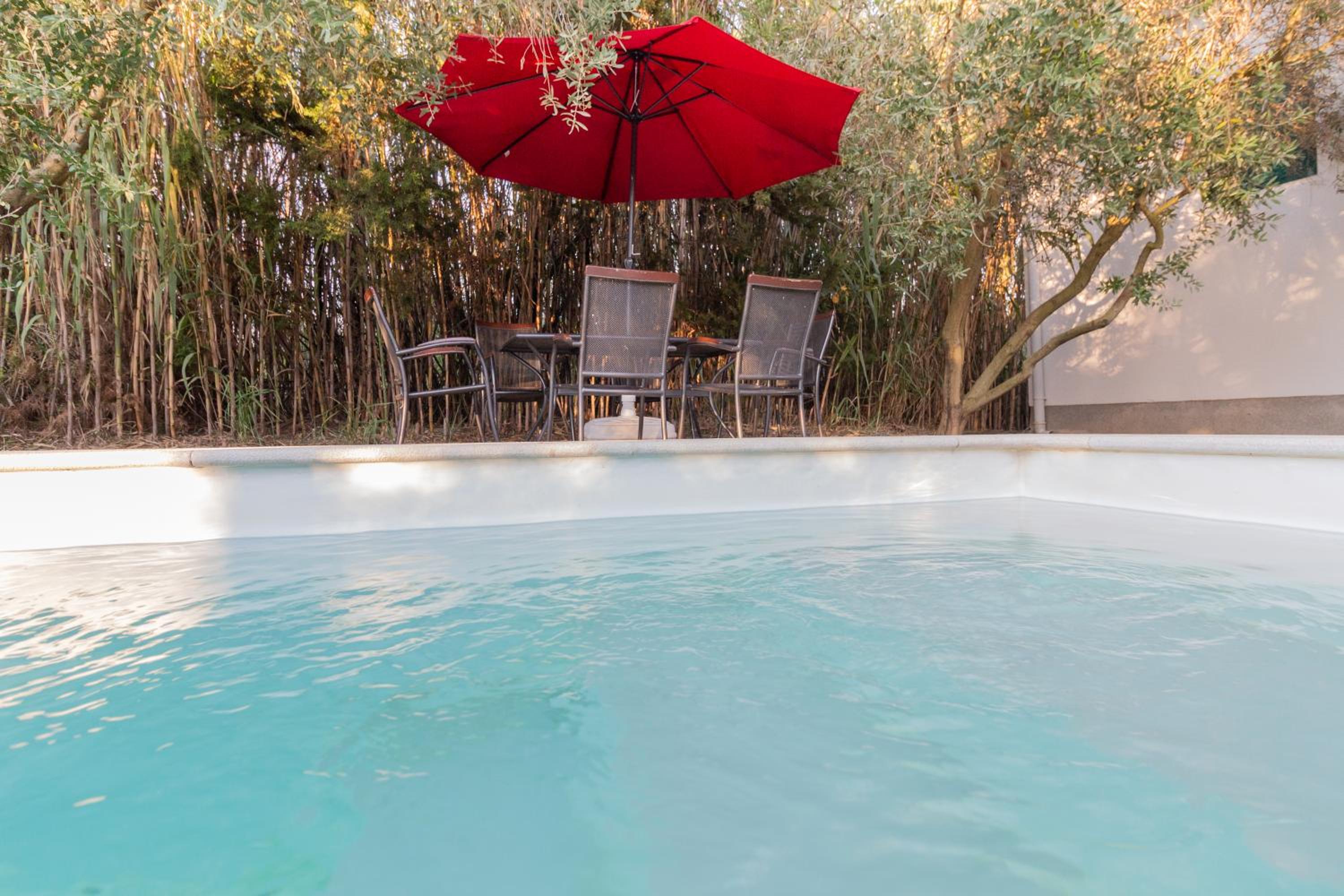 Holiday house Domagoj with a swimming pool and a large yard view 4