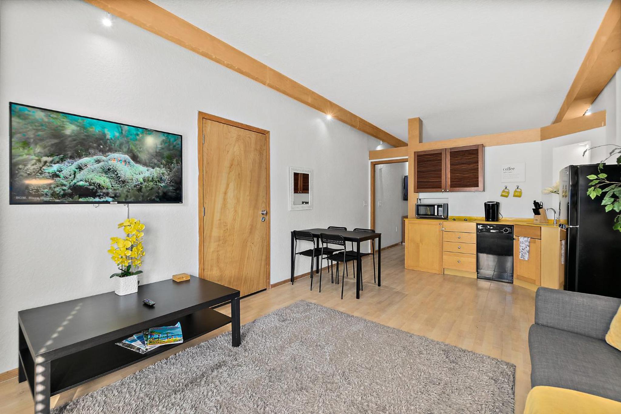 Cozy Queen Suite in European Village with Balcony view near beaches view 4