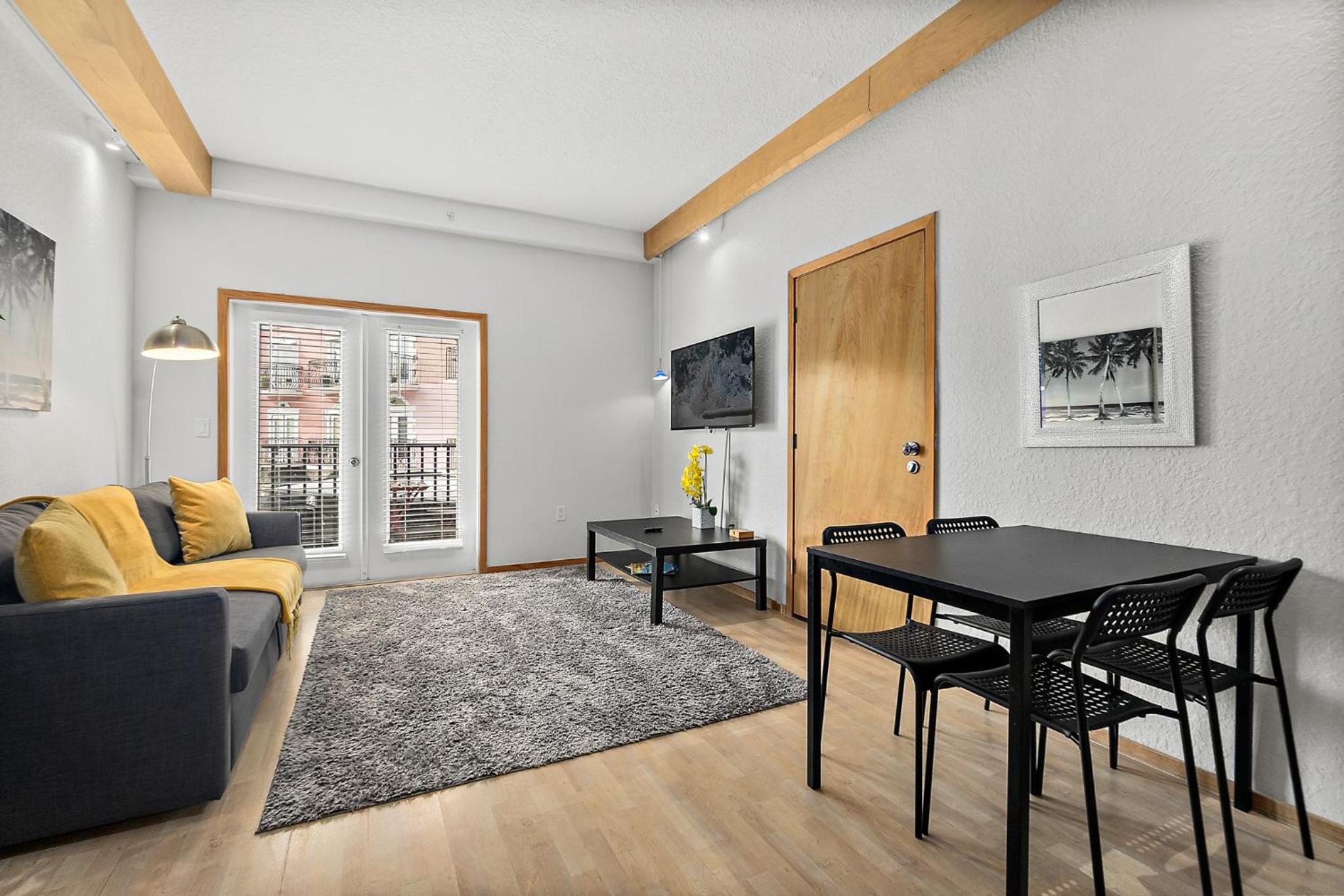 Cozy Queen Suite in European Village with Balcony view near beaches view 2