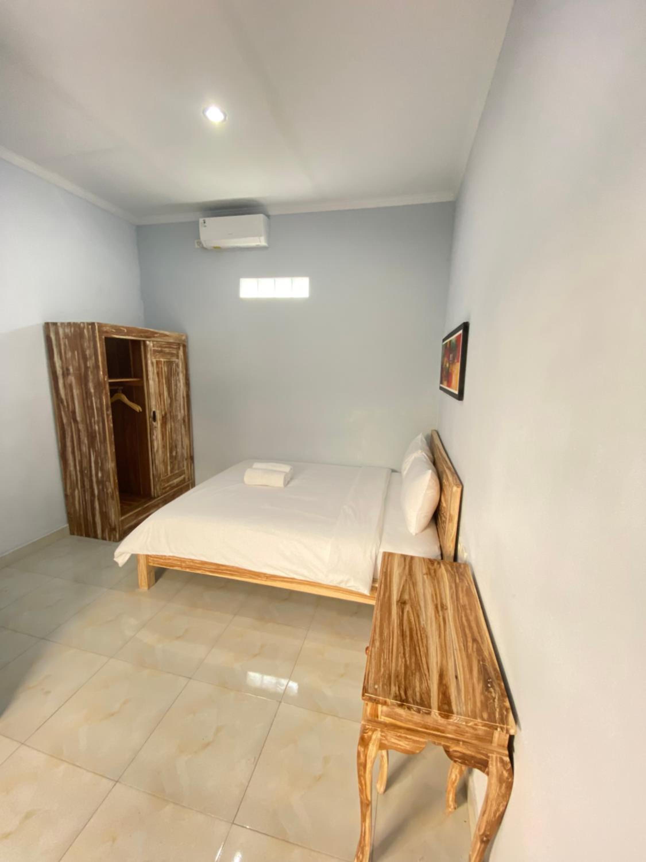 Nyoman Guest House — hotel room