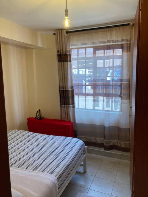 Nomi's Nook1 B-room rental unit free parking in Nakuru CBD view 2