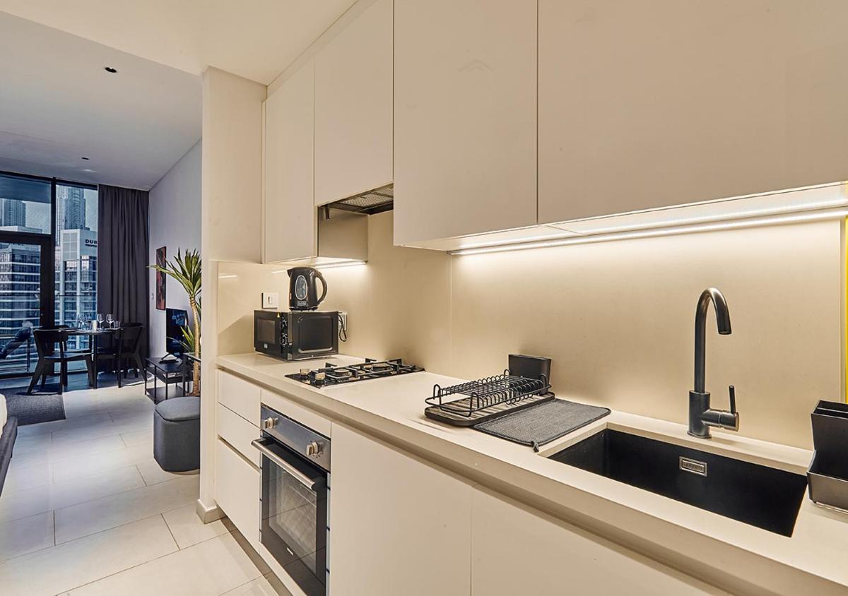 Luxury Studios with Burj Khalifa & Canal View in Downtown - Marquise Square Tower