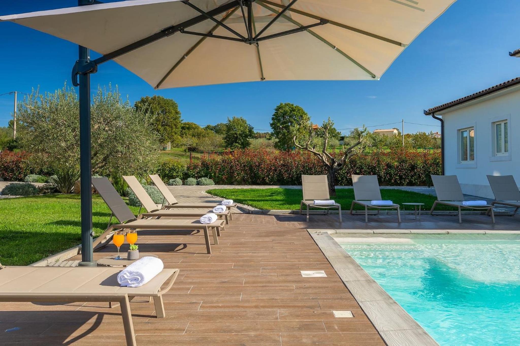 Modern villa Grgo with pool and jacuzzi in Tinjan view 2