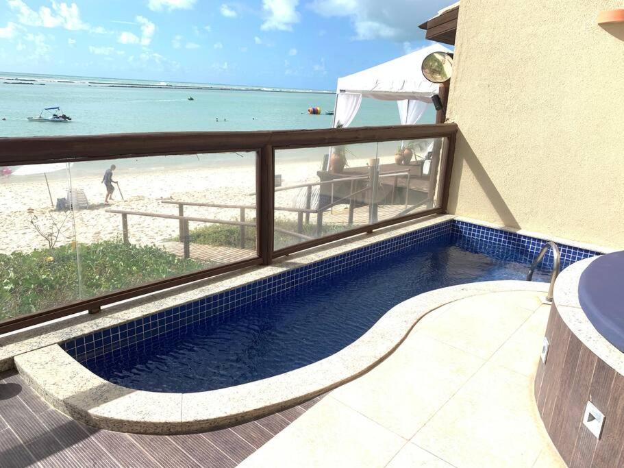 Condomínio Barra Bali apartamento térreo de frente para mar