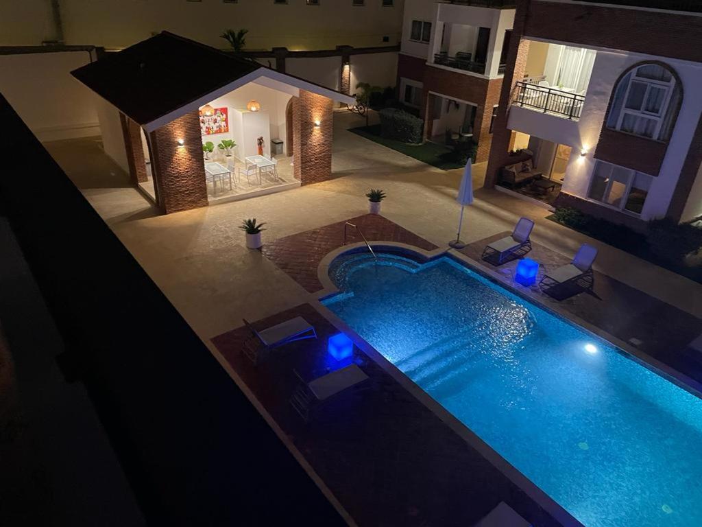 SEVEN SHADES OF CORAL VILLAGE - suites & pool in a residence close to the beach