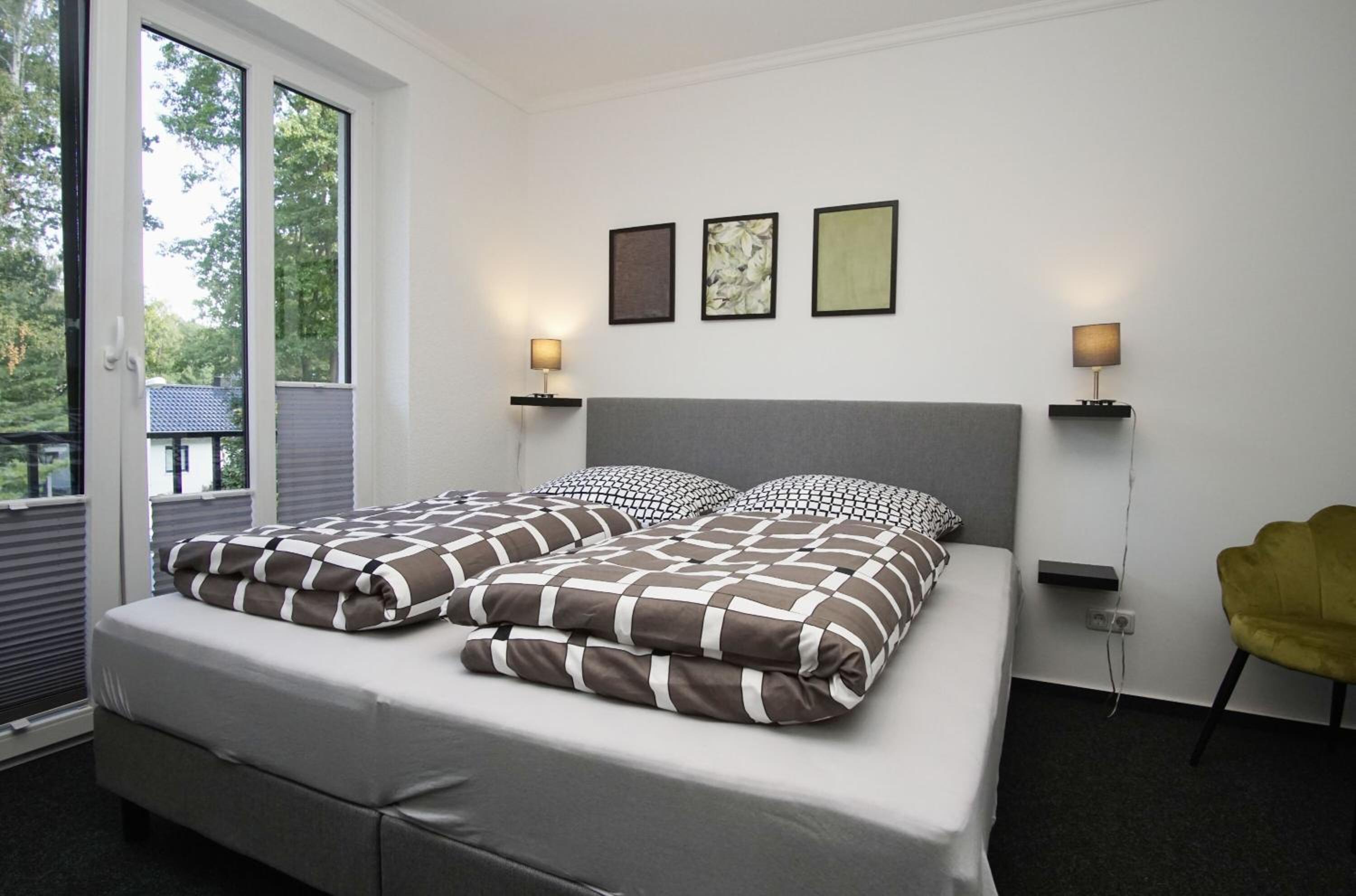 Direkt am Waldrand mit Balkon und in Strandnähe - Ferienwohnung Cosmo