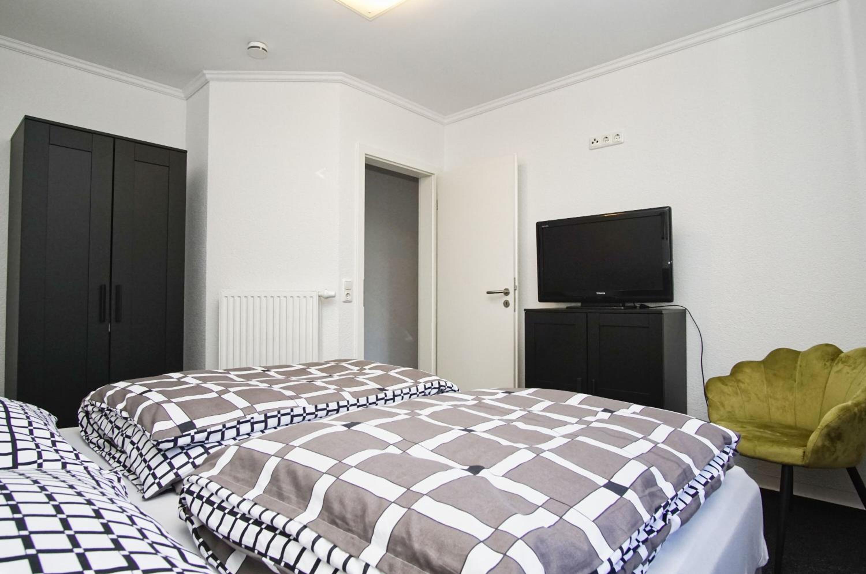 Direkt am Waldrand mit Balkon und in Strandnähe - Ferienwohnung Cosmo