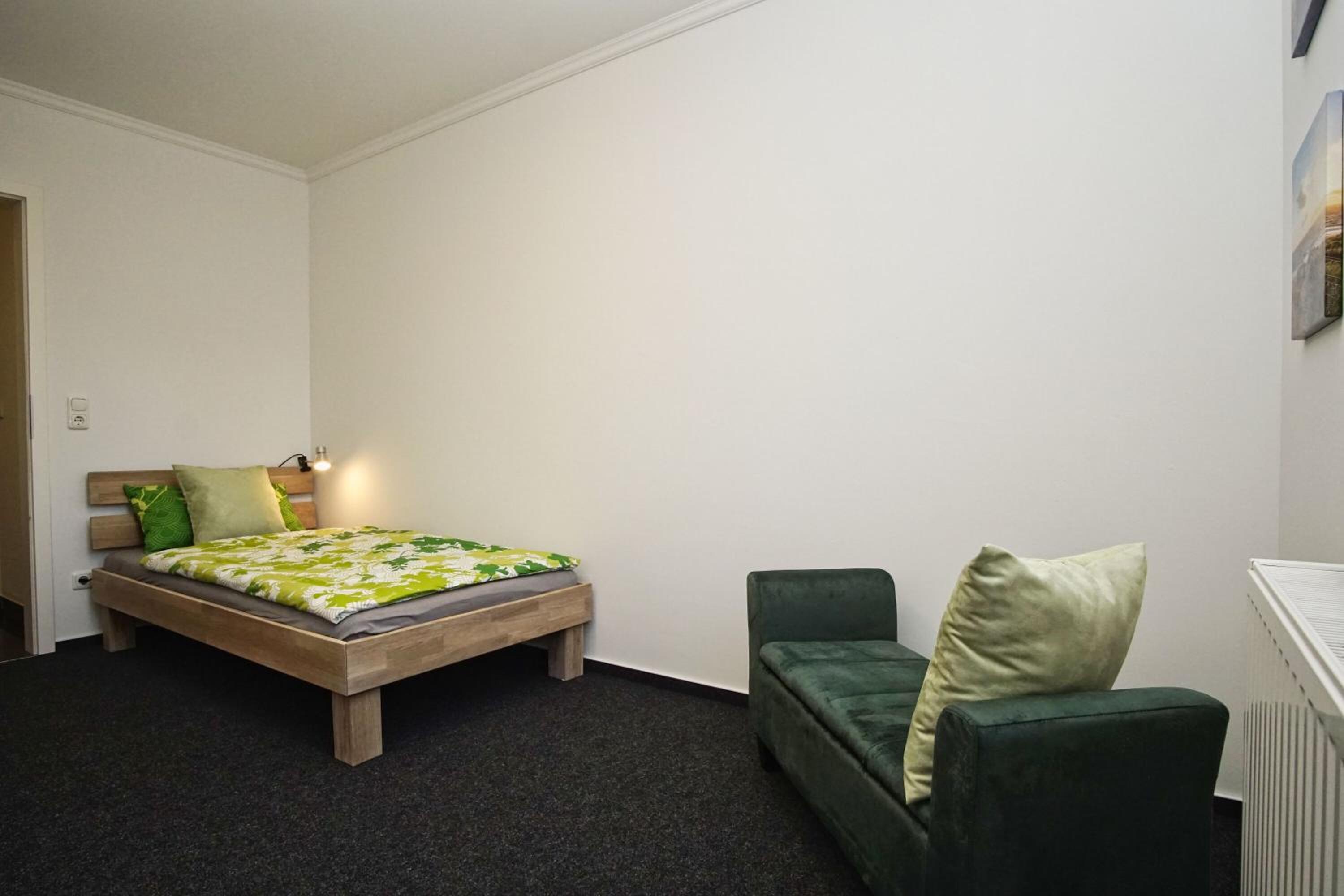 Direkt am Waldrand mit Balkon und in Strandnähe - Ferienwohnung Cosmo