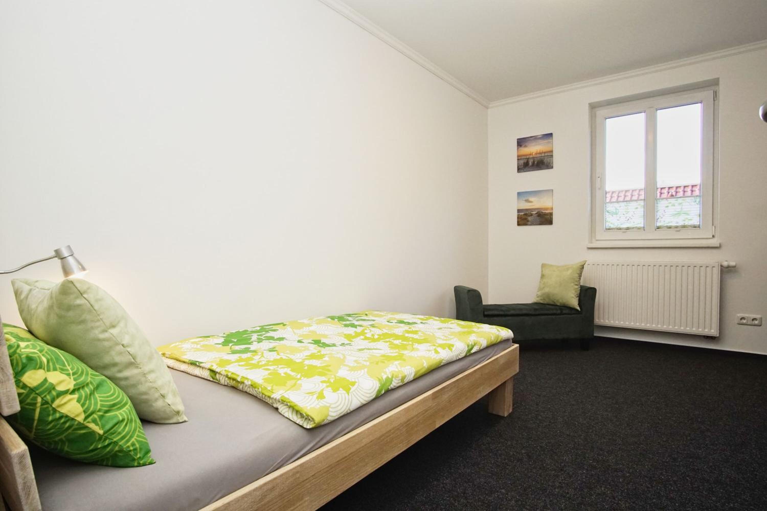 Direkt am Waldrand mit Balkon und in Strandnähe - Ferienwohnung Cosmo