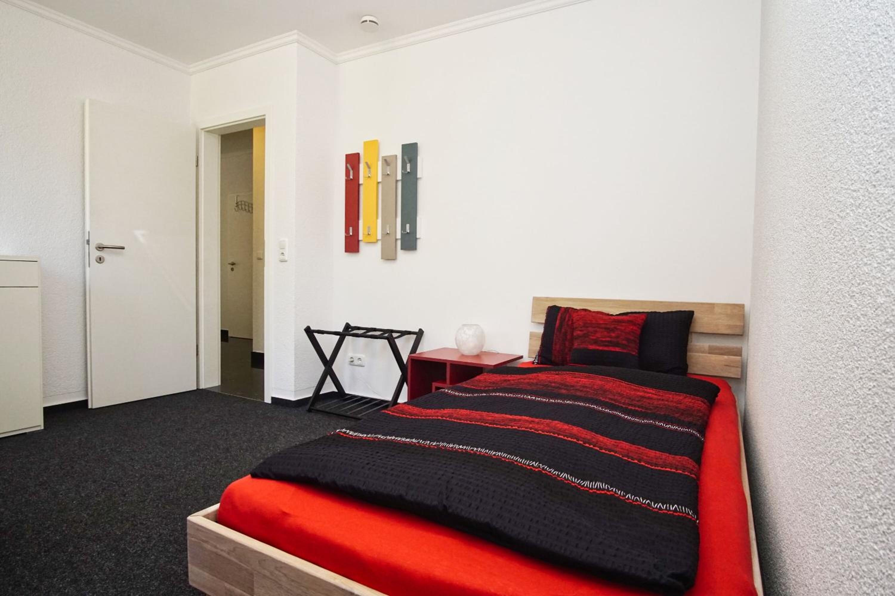 Direkt am Waldrand mit Balkon und in Strandnähe - Ferienwohnung Cosmo