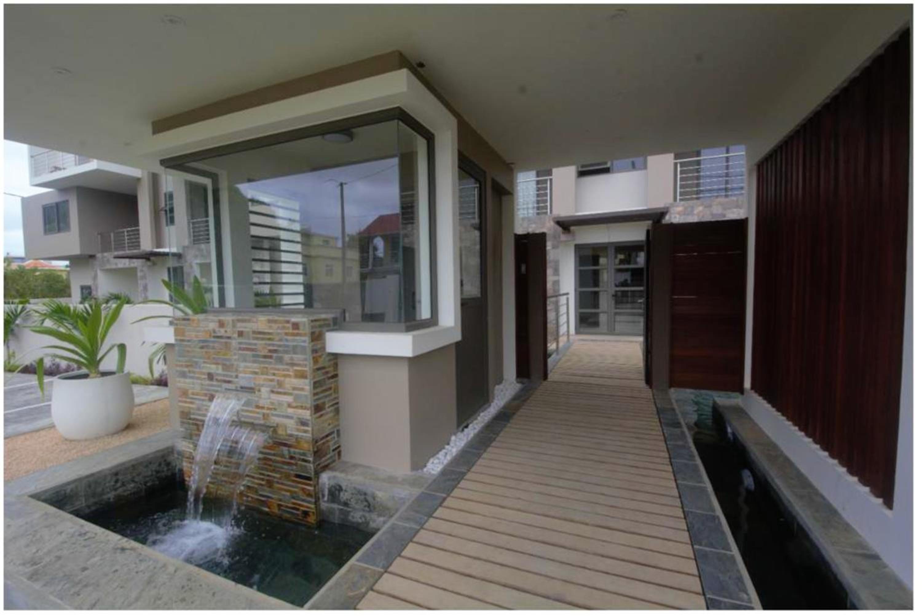 Charming apartment in Flic en Flac with shared pool