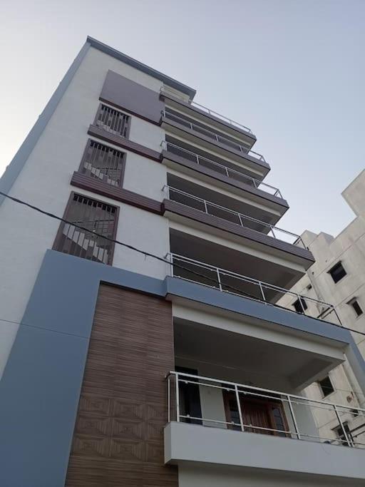 Servostay KPHB Phase 15 New Stunning 3 BHK - 5th Floor with Private Parking view 2