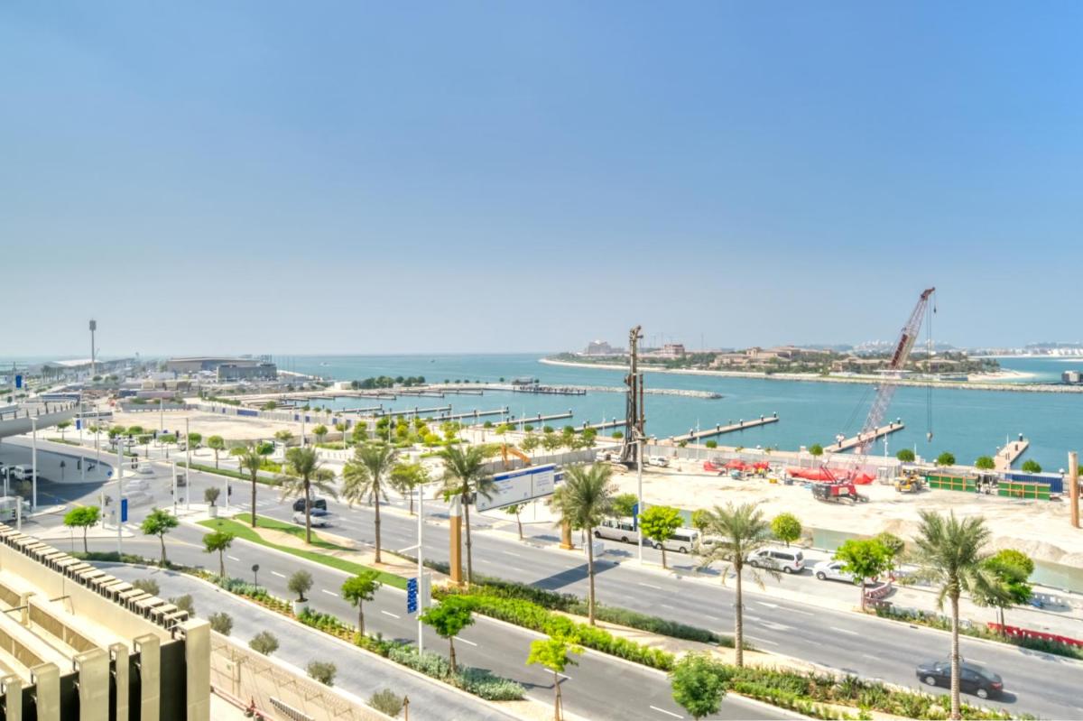 Emaar Beach Front 2BR with Sea & Marina Skyline Views