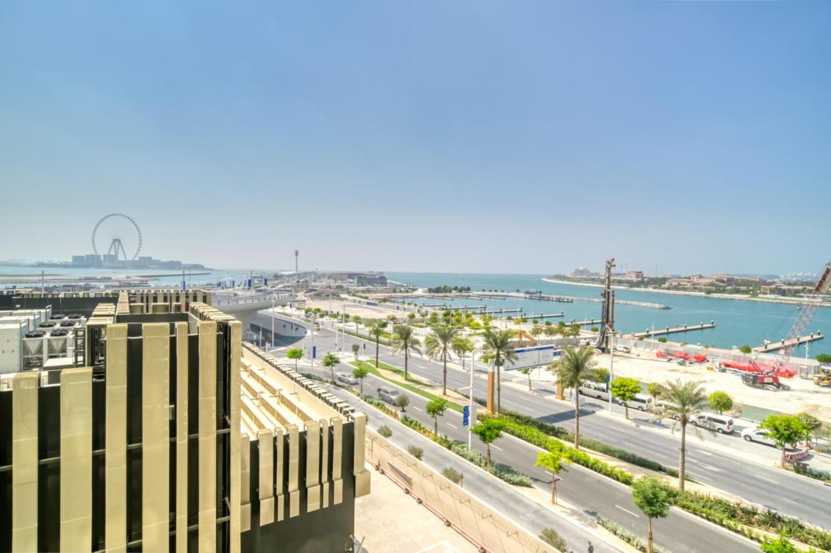 Emaar Beach Front 2BR with Sea & Marina Skyline Views