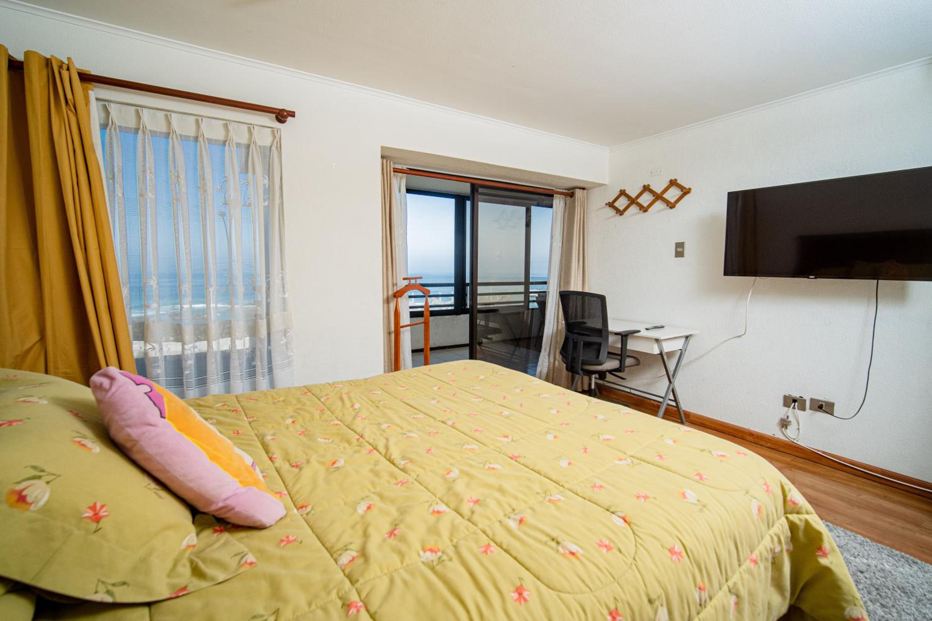 Departamento grande frente a playa Cavancha