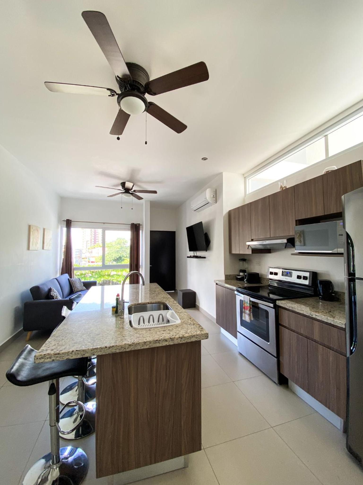 Hermoso Condominio en el Centro de Jaco Lapa Living view 3