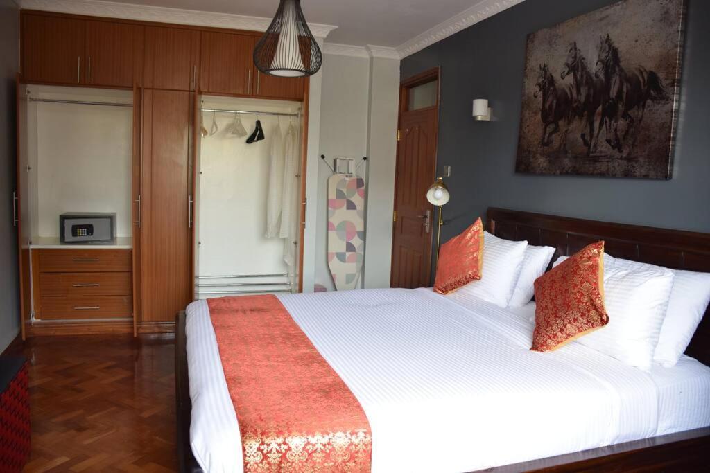 Upscale King Size Bed in the heart of Nairobi view 5