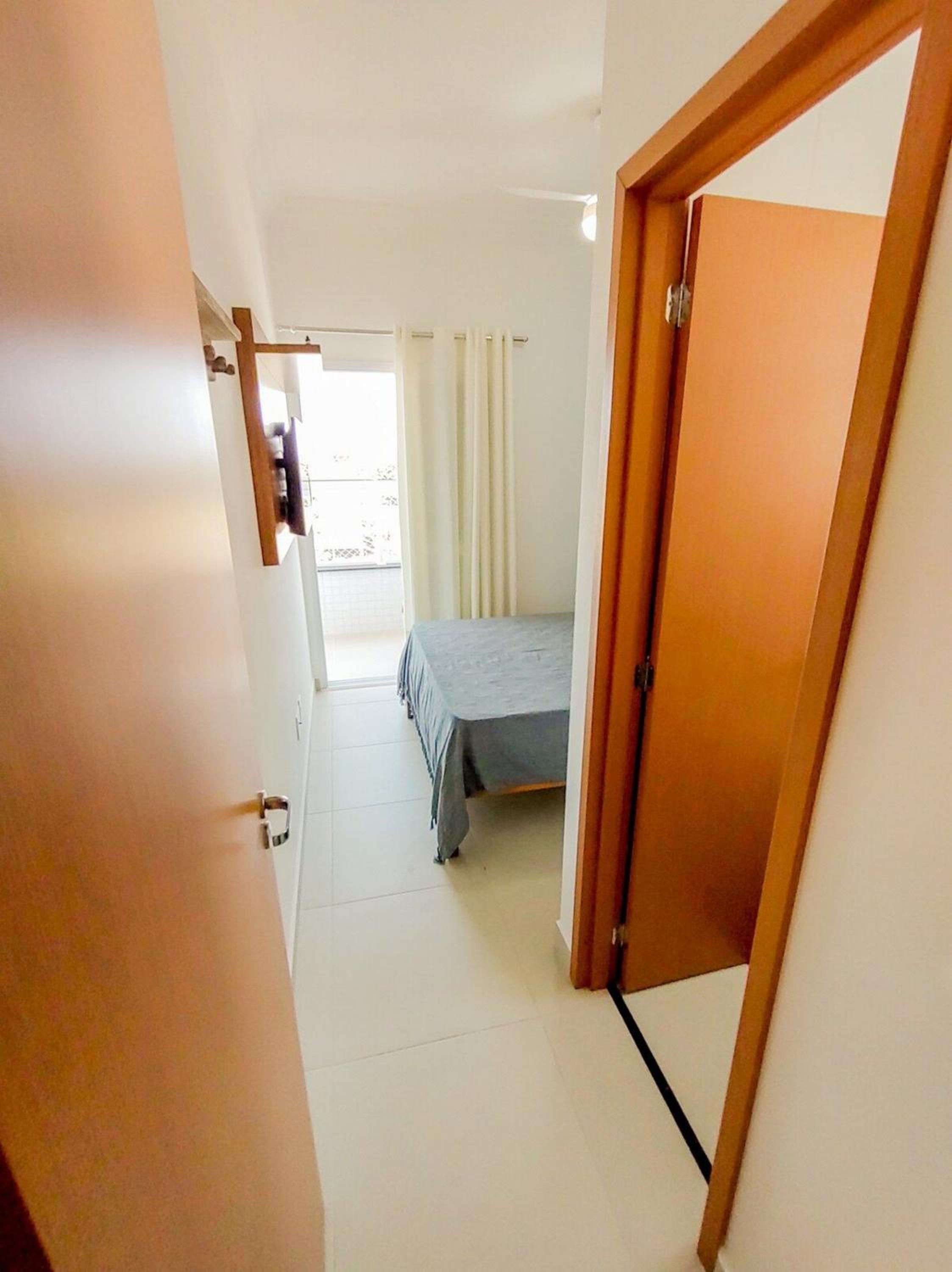 Apartamentos 300m Praia das Toninhas - vista para a serra do mar