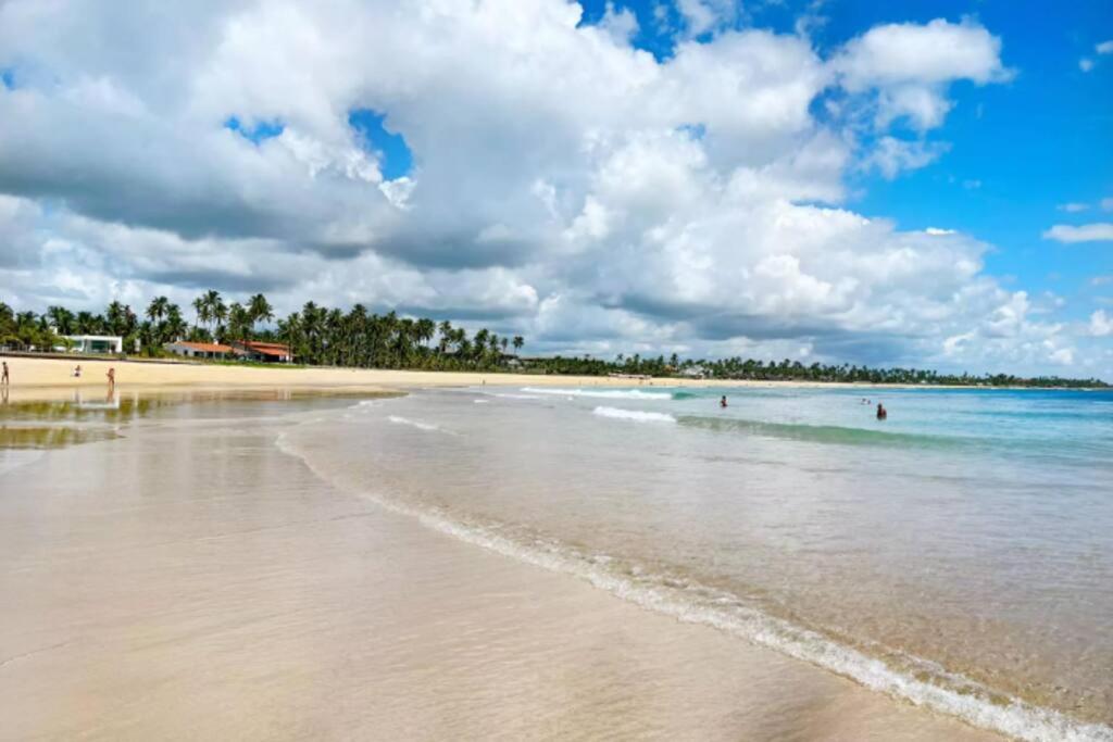 Flat em condomínio beira mar. Apto incrível!