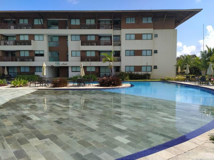 Flat em condomínio beira mar. Apto incrível!