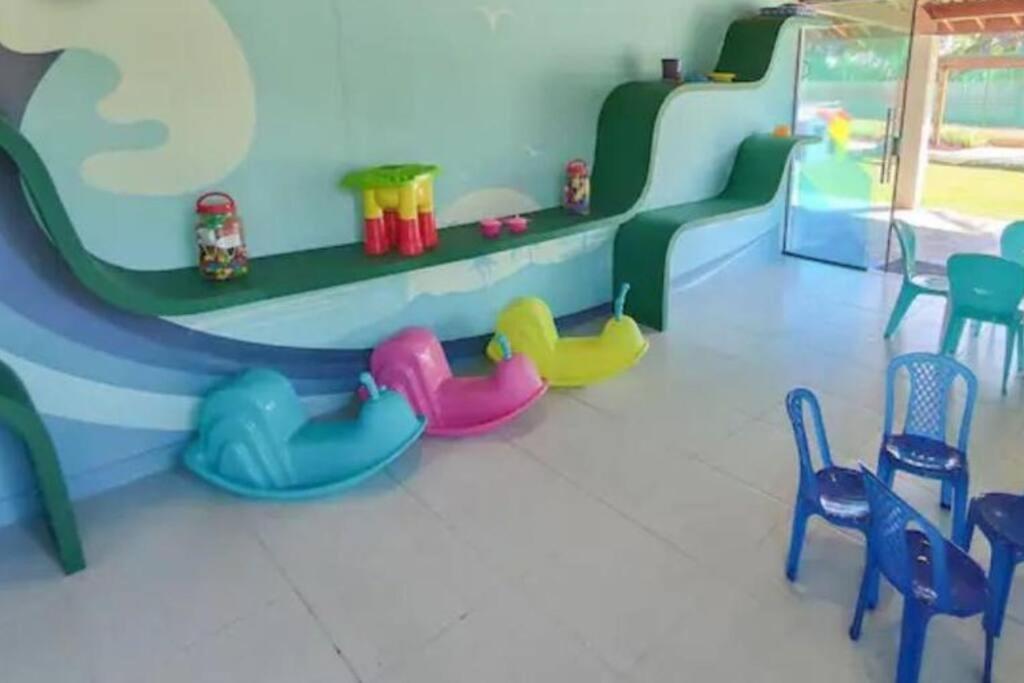 Flat em condomínio beira mar. Apto incrível!