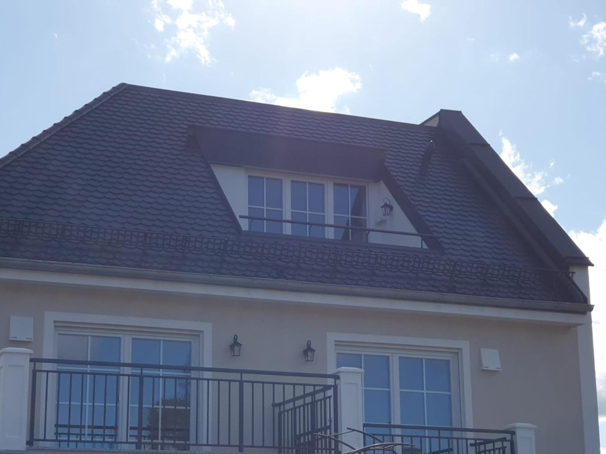 Exklusive Neubau Dachterrassenwohnung mit Wohnungslift in Vierfamilienvilla