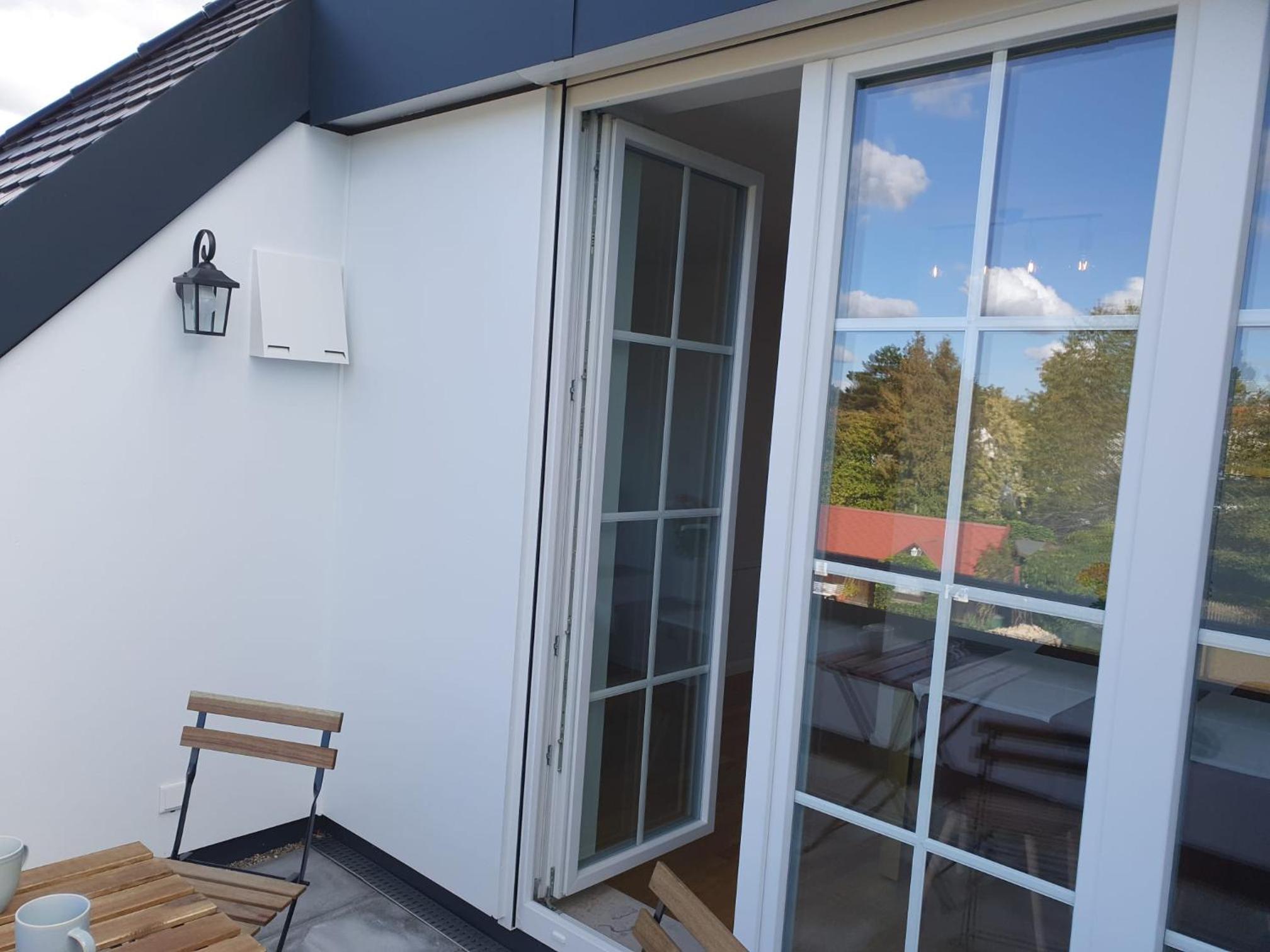 Exklusive Neubau Dachterrassenwohnung mit Wohnungslift in Vierfamilienvilla