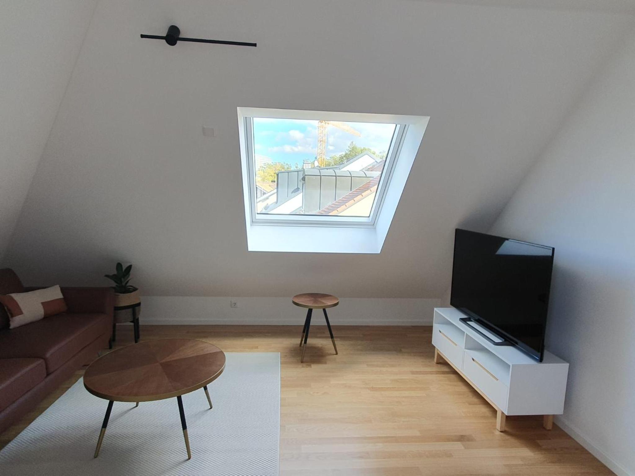 Exklusive Neubau Dachterrassenwohnung mit Wohnungslift in Vierfamilienvilla