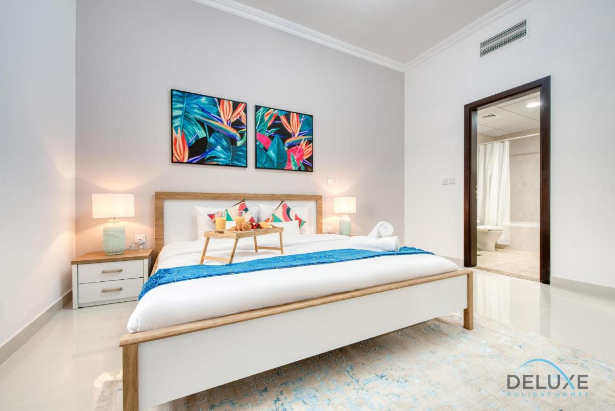Vivid 2BR at Canal Residences West Dubai Sports City by Deluxe Holiday Homes