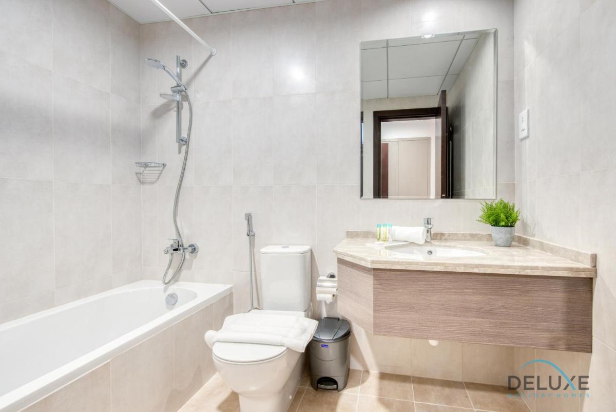 Vivid 2BR at Canal Residences West Dubai Sports City by Deluxe Holiday Homes