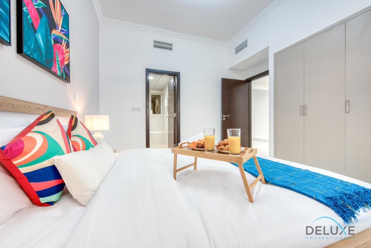 Vivid 2BR at Canal Residences West Dubai Sports City by Deluxe Holiday Homes