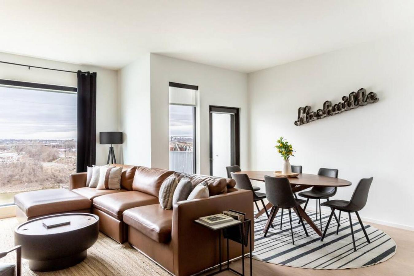 Stunning River View Condo Walk to Downtown Rooftop Patio view 2
