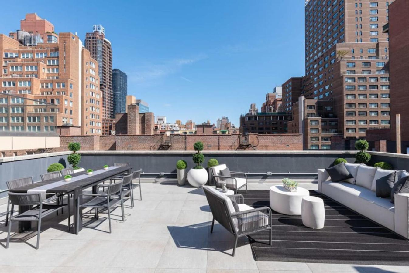 3BR Penthouse with Massive Private Rooftop - Image 4